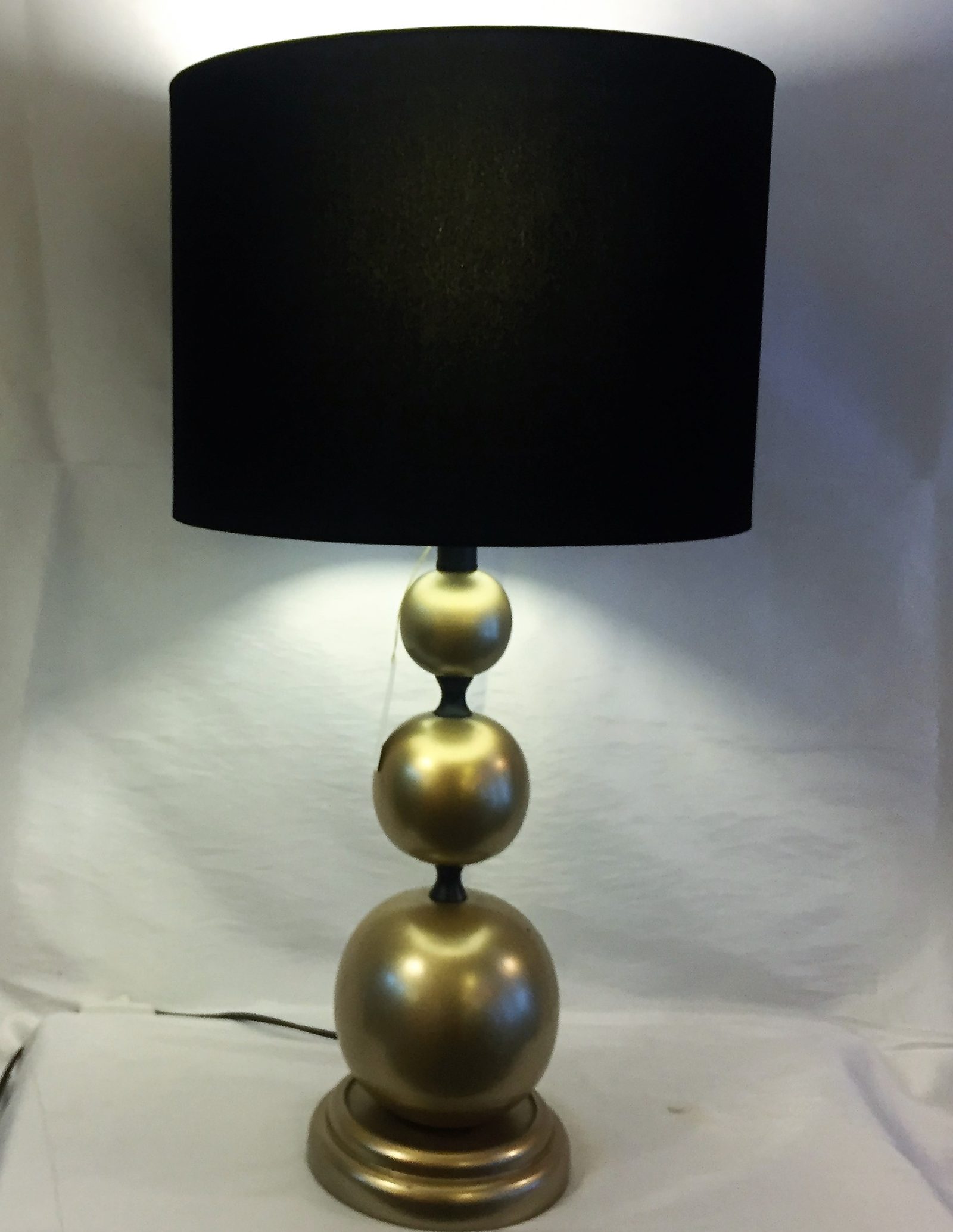 Custom lamp with a rounded sculptural base